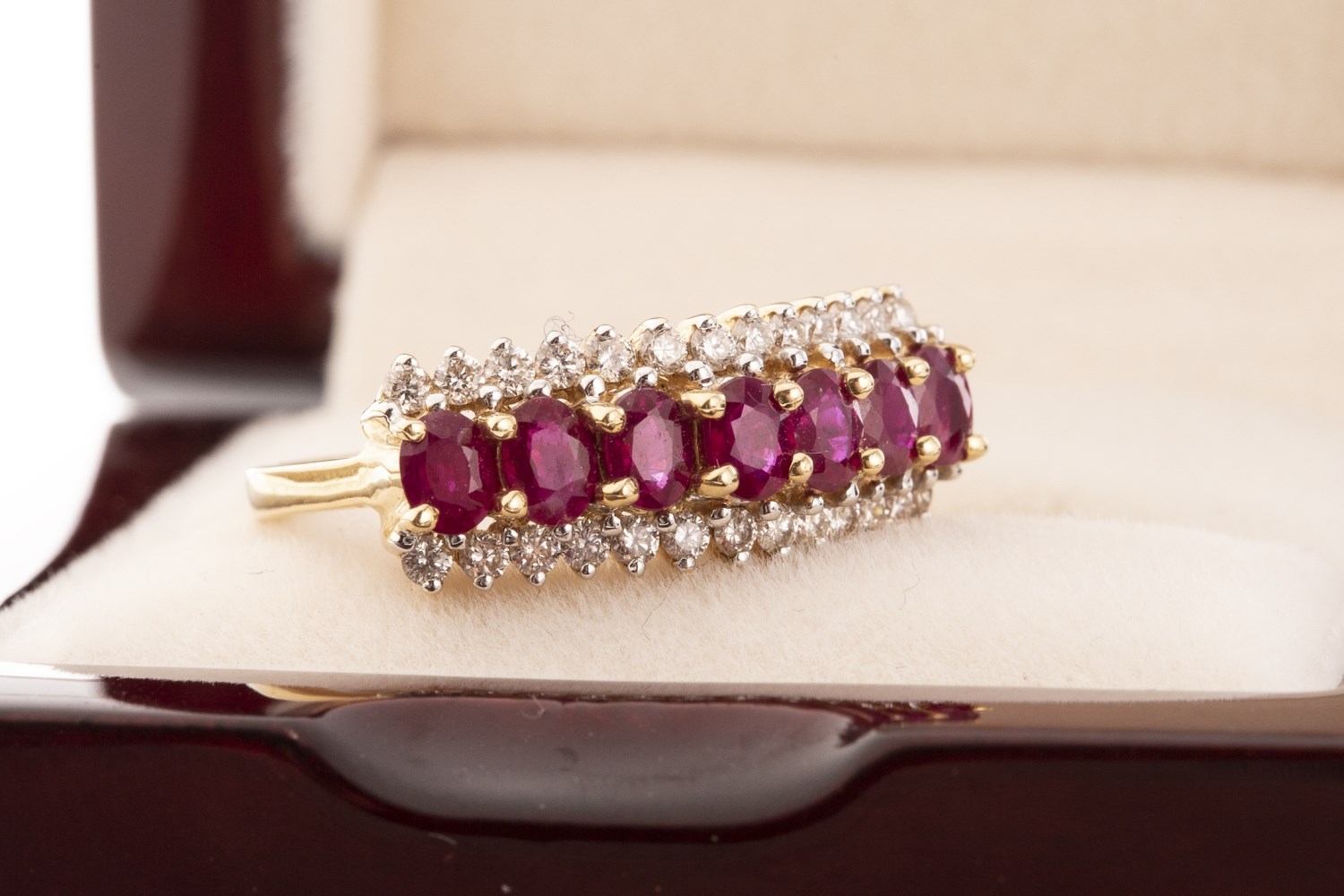 Lot 230 A RED GEM AND DIAMOND RING