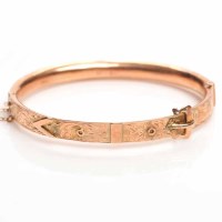 Lot 1915 - LATE VICTORIAN BUCKLE MOTIF BANGLE with floral...