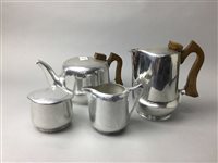 Lot 387 - A PICQUOT WARE FOUR PIECE TEA SERVICE