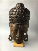 Lot 400 - A LARGE CARVED WOODEN BUDDHA HEAD