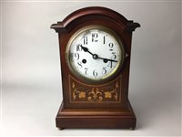 Lot 450 - AN EDWARDIAN INLAID MAHOGANY MANTEL CLOCK