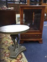 Lot 76 - AN OVAL TABLE AND A YEW WOOD CABINET
