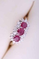 Lot 1961 - RUBY AND DIAMOND CLUSTER RING set with three...