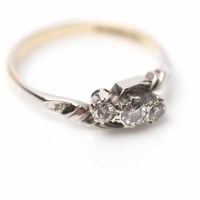 Lot 1964 - DIAMOND THREE STONE RING set with three...