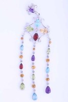 Lot 1966 - UNUSUAL MULTI GEM SET PENDANT of scrolling...