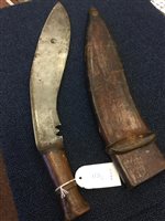 Lot 1731 - AN EARLY 20TH CENTURY MILITARY ISSUE KUKRI AND TWO OTHER BLADES