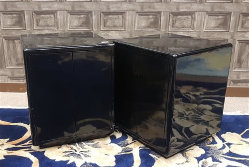 Lot 1106 - A PAIR OF CHINESE EBONISED SQUARE PEDESTAL CABINETS
