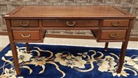 Lot 1107 - A CHINESE HARDWOOD WRITING TABLE