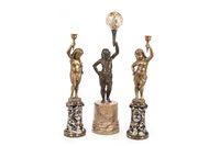Lot 1828 - A CAST BRONZED FIGURE AND A PAIR OF CANDLESTICKS