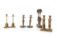 Lot 1831 - A PAIR OF VICTORIAN CANDLESTICKS AND THREE OTHERS