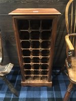Lot 258 - A STAINED PINE WALL RACK