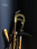Lot 219 - A GROUP OF WALKING STICKS AND CROOKS