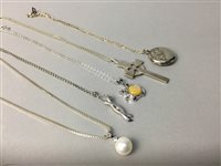 Lot 417 - A LOT OF FIVE SILVER PENDANTS AND CHAINS