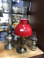 Lot 434 - A LOT OF FOUR OIL LAMPS
