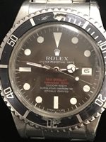 Lot 755 - A RARE ROLEX DOUBLE RED SEA-DWELLER SUBMARINER