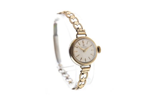 Lot 761 - A LADY'S GOLD OMEGA WATCH