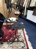 Lot 101 - AN IRON STAND WITH HOT WATER POT AND BURNER