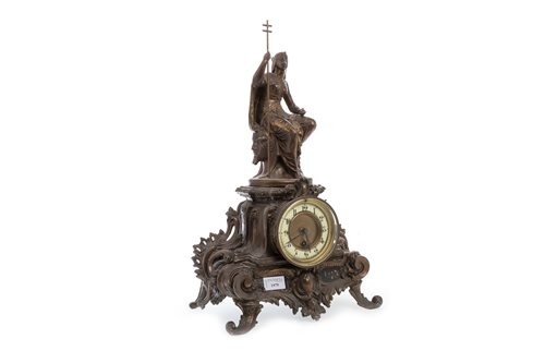 Lot 1979 - A MANTEL CLOCK MOUNTED WITH A FIGURE OF A PHARAOH