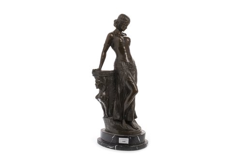 Lot 1980 - A FIGURE OF AN EGYPTIAN LADY