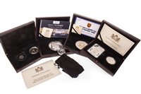 Lot 548 - A LOT OF FIVE SILVER PROOF COINS AND COIN SETS
