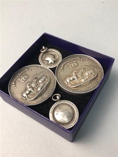 Lot 221 - A LOT OF FOUR SILVER AGRICULTURAL MEDALS