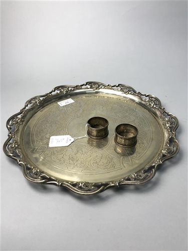 Lot 229 - A SILVER PLATED PRESENTATION PLATE AND TWO SILVER NAPKIN RINGS