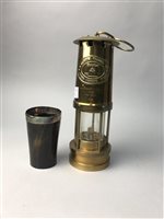 Lot 327 - A MINER'S LAMP WITH A HORN CUP