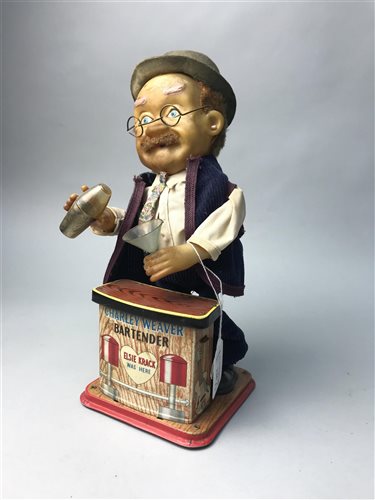 Lot 326 - A CHARLEY WEAVER BATTERY OPERATED BARTENDER WITH TWO TRUCKS