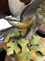 Lot 1207 - A ROYAL WORCESTER RED-BREASTED NUTHATCH AND OAK