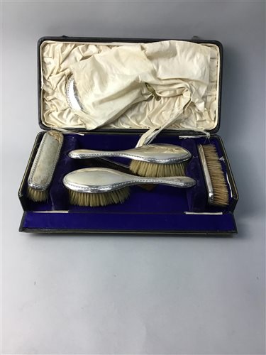 Lot 58 - A SILVER DRESSING TABLE SET