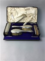 Lot 58 - A SILVER DRESSING TABLE SET