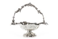 Lot 811 - AN ELABORATELY DECORATED VICTORIAN SILVER BASKET