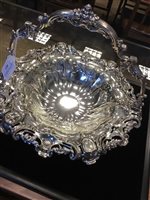 Lot 811 - AN ELABORATELY DECORATED VICTORIAN SILVER BASKET