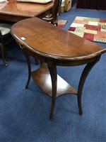 Lot 123 - A REPRODUCTION DEMI LUNE SIDE TABLE