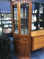 Lot 171 - A BOW-FRONTED CORNER DISPLAY CABINET