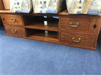 Lot 139 - A HARDWOOD LOW CHEST