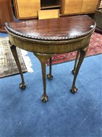Lot 244 - A MAHOGANY TURNOVER CARD TABLE AND A FIRE SCREEN (2)
