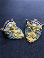 Lot 345 - A PAIR OF WALL BRACKETS WITH TEAPOT STANDS