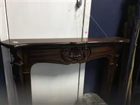 Lot 153 - A REPRODUCTION FIREPLACE SURROUND