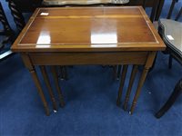 Lot 213 - A YEW WOOD NEST OF THREE TABLES