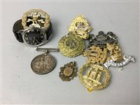 Lot 39 - A LOT OF BADGES, A MEDAL AND A MILITARY STYLE WRIST WATCH