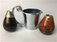 Lot 76 - A LOT OF TWO NUT FLASKS AND A MILK JUG