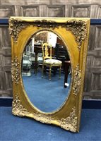 Lot 211 - A LARGE WALL MIRROR