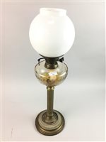 Lot 246 - A BRASS OIL LAMP
