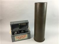 Lot 328 - A 1976 NAVAL SHELL CASE AND AN ASTRO COMPASS