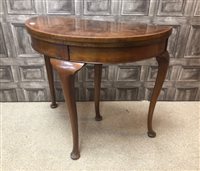 Lot 250 - A WALNUT FOLD OVER CARD TABLE