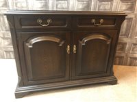 Lot 253 - AN OAK SIDEBOARD