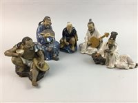 Lot 280 - A LOT OF NINE CHINESE GLAZED CERAMIC SEATED FIGURES