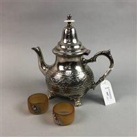 Lot 347 - A MOROCCAN SILVER PLATED TEAPOT AND TWO NAPKIN RINGS