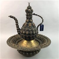 Lot 348 - A MIDDLE EASTERN COPPER KETTLE ON STAND